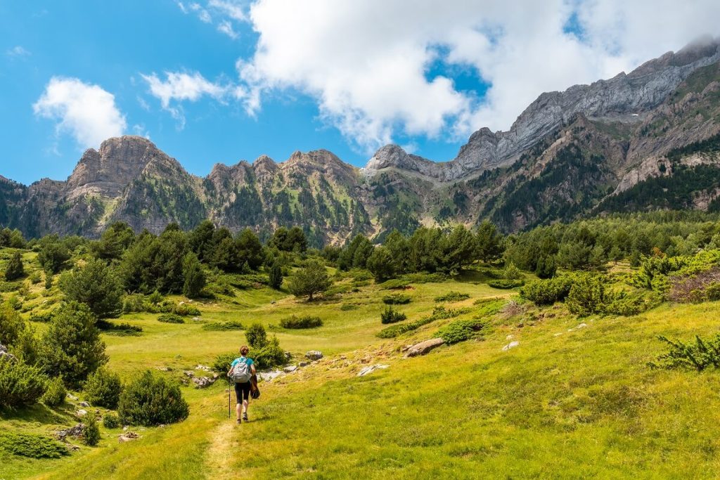 A young woman on the-trek going up the mountain