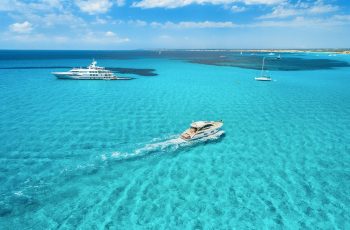 Yacht on the Azure Seashore in Balearic Islands, Spain